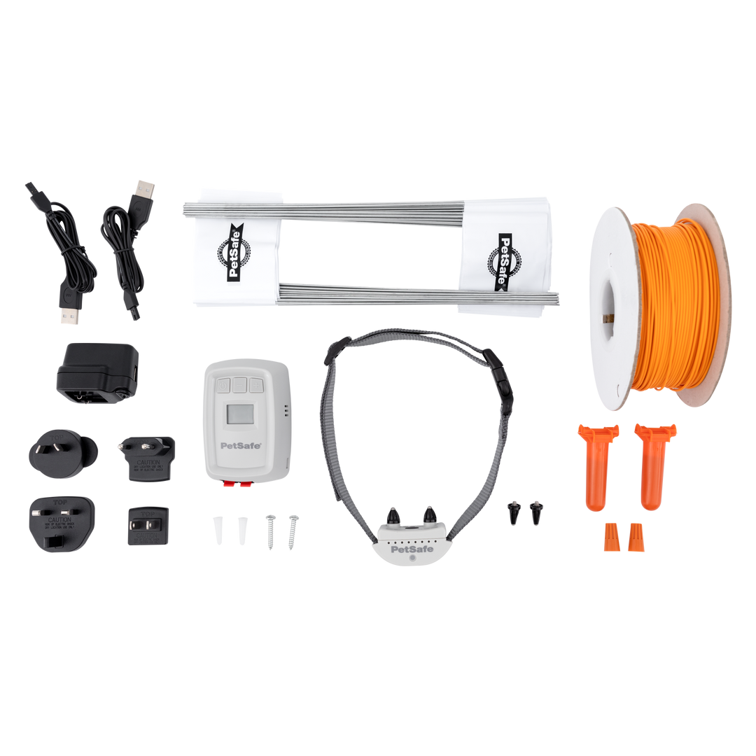 PetSafe Classic In-Ground Fence full components: transmitter, plug adaptors, charging cables, collar, wire, flags, capsules and connectors