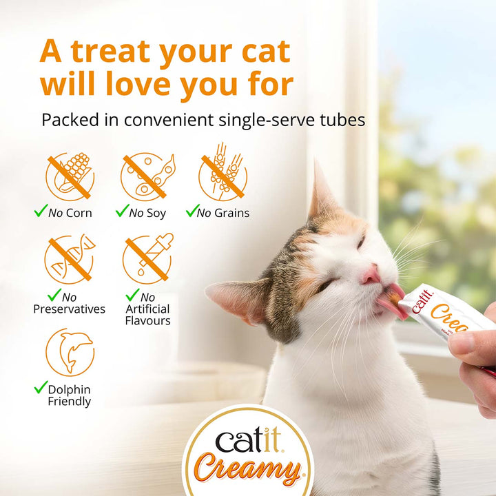 Cat licking Catit Creamy from the tube: no corn, soy, grains, preservatives or artificial flavours