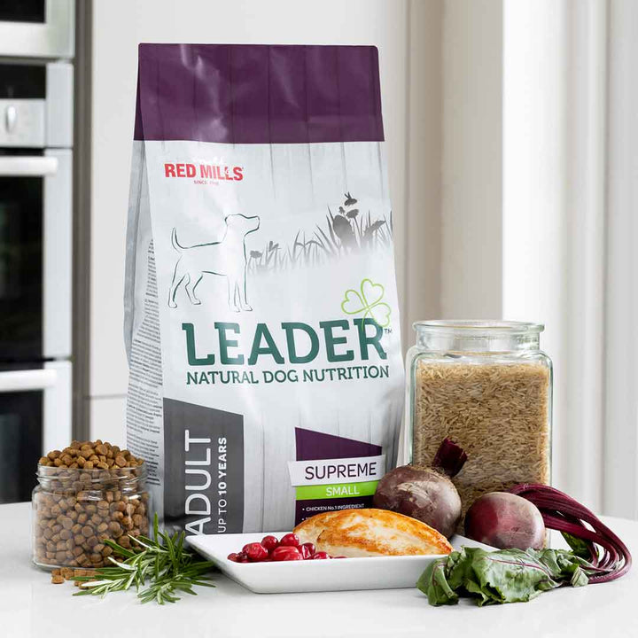 Leader Adult Supreme Small Breed dog food bag with chicken, cranberries, beetroot and botanical ingredients