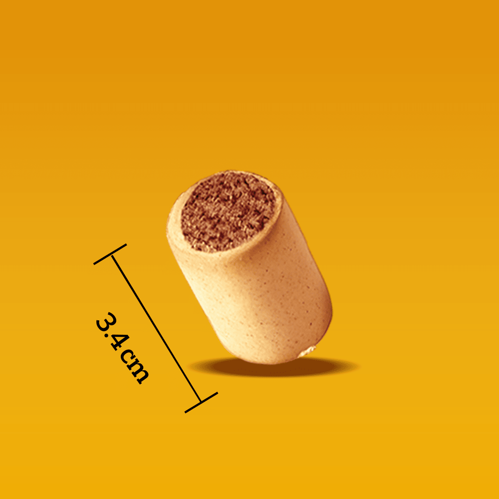 Pedigree Markies Original biscuit showing crunchy shell and meaty centre, approx 3.4cm long