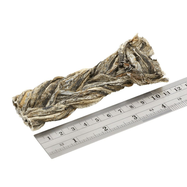 Fish4Dogs Sea Jerky Fish Whopper chew shown against a ruler for size